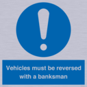 vehicles-must-be-reversed-with-a-banksman~